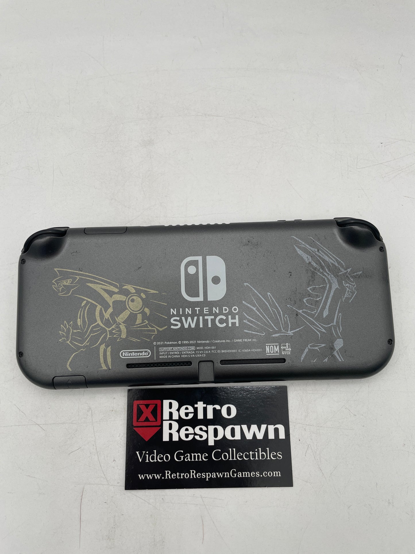 Nintendo Switch Lite: Dialga & Palkia Edition - Nintendo Switch (Console+Charger)