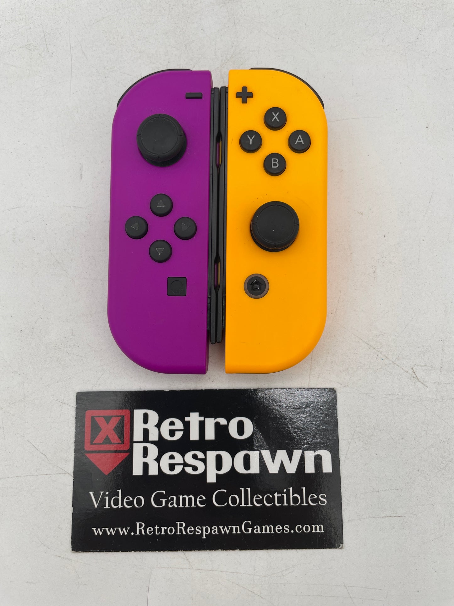 Joy-Con Neon Purple & Neon Orange - Nintendo Switch (Controllers Only)