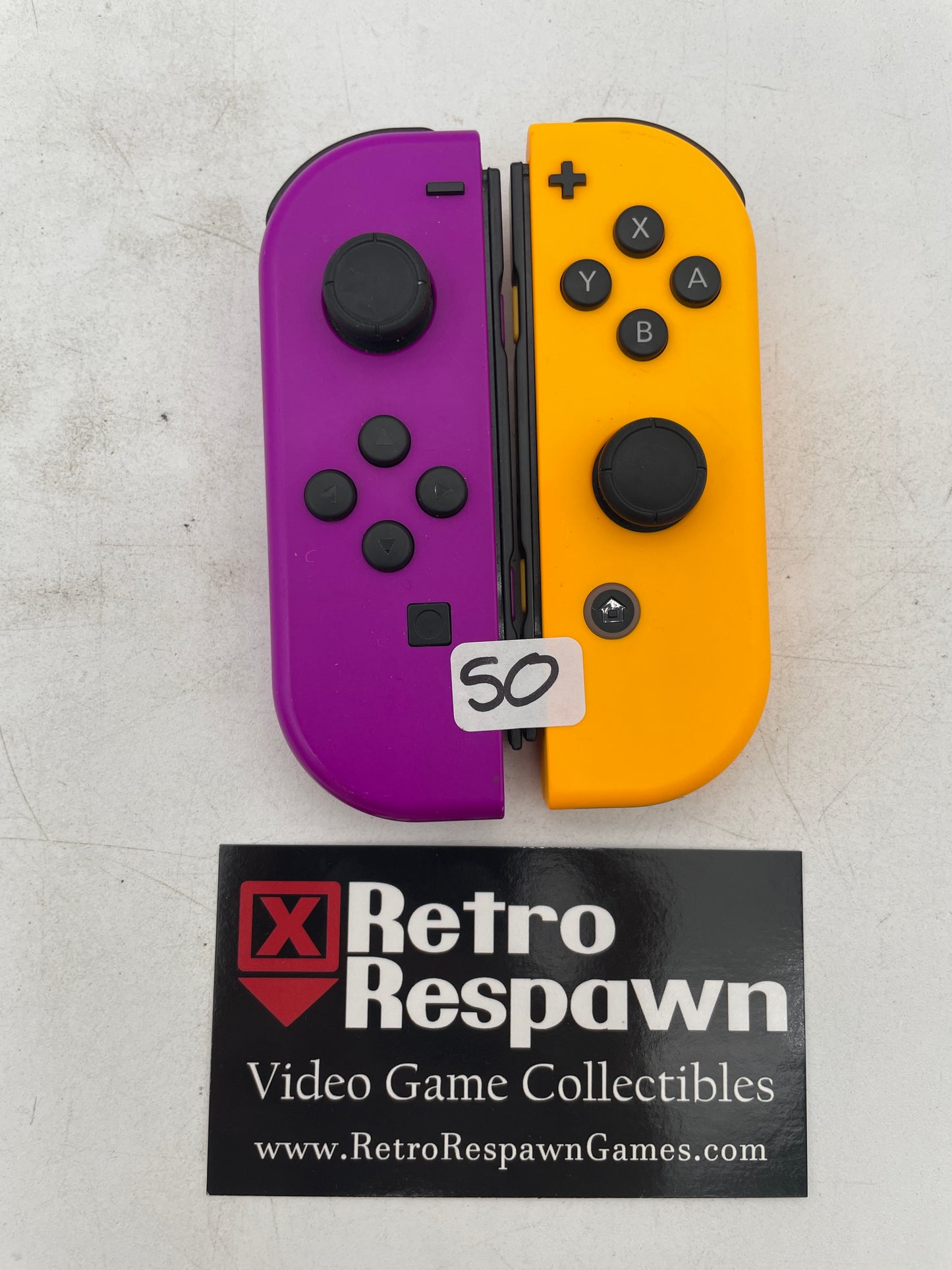 Joy-Con Neon Purple & Neon Orange - Nintendo Switch (Controllers Only)