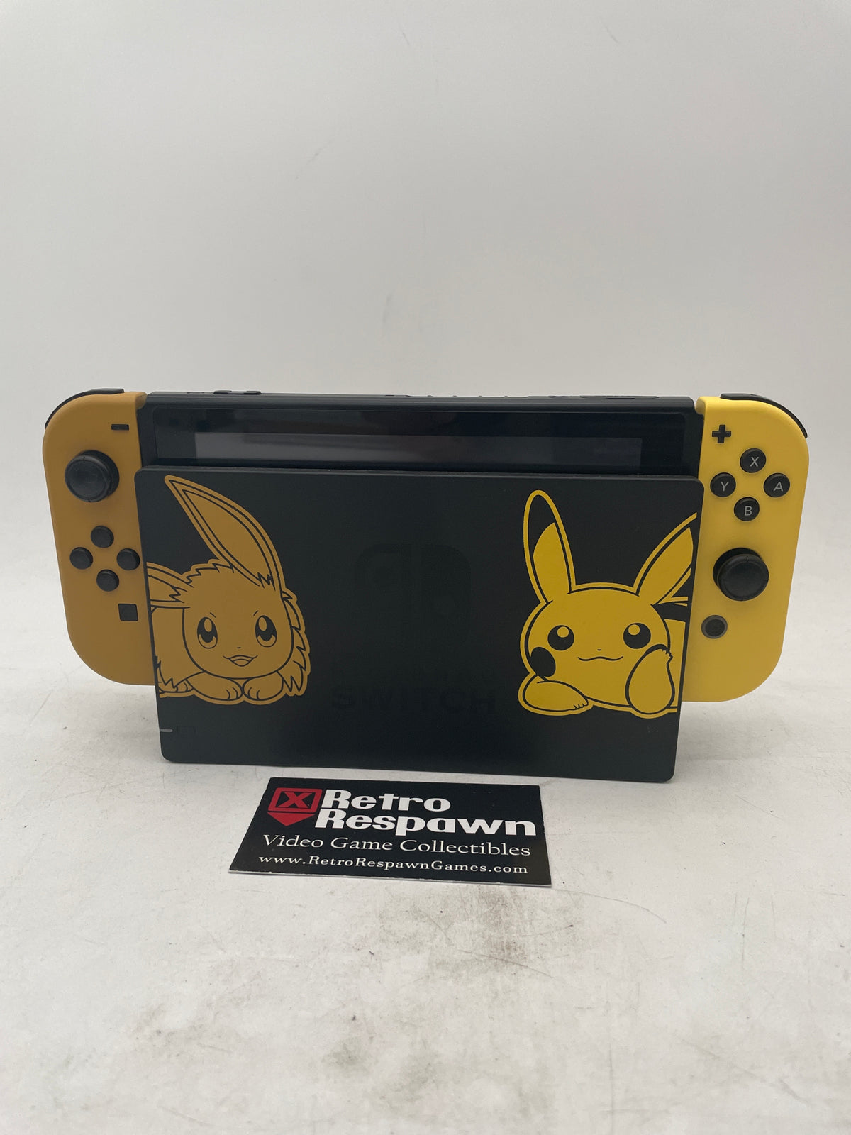 Nintendo Switch Pokemon: Let's Go Eevee/Pikachu Edition - Nintendo Switch (Console, Controller, all Wires)