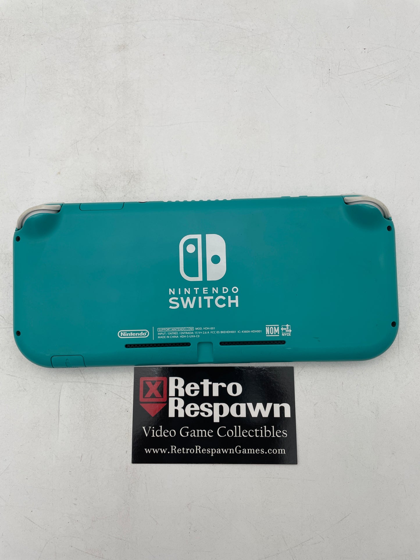 Nintendo Switch Lite [Turquoise] - Nintendo Switch (Console + Charger)