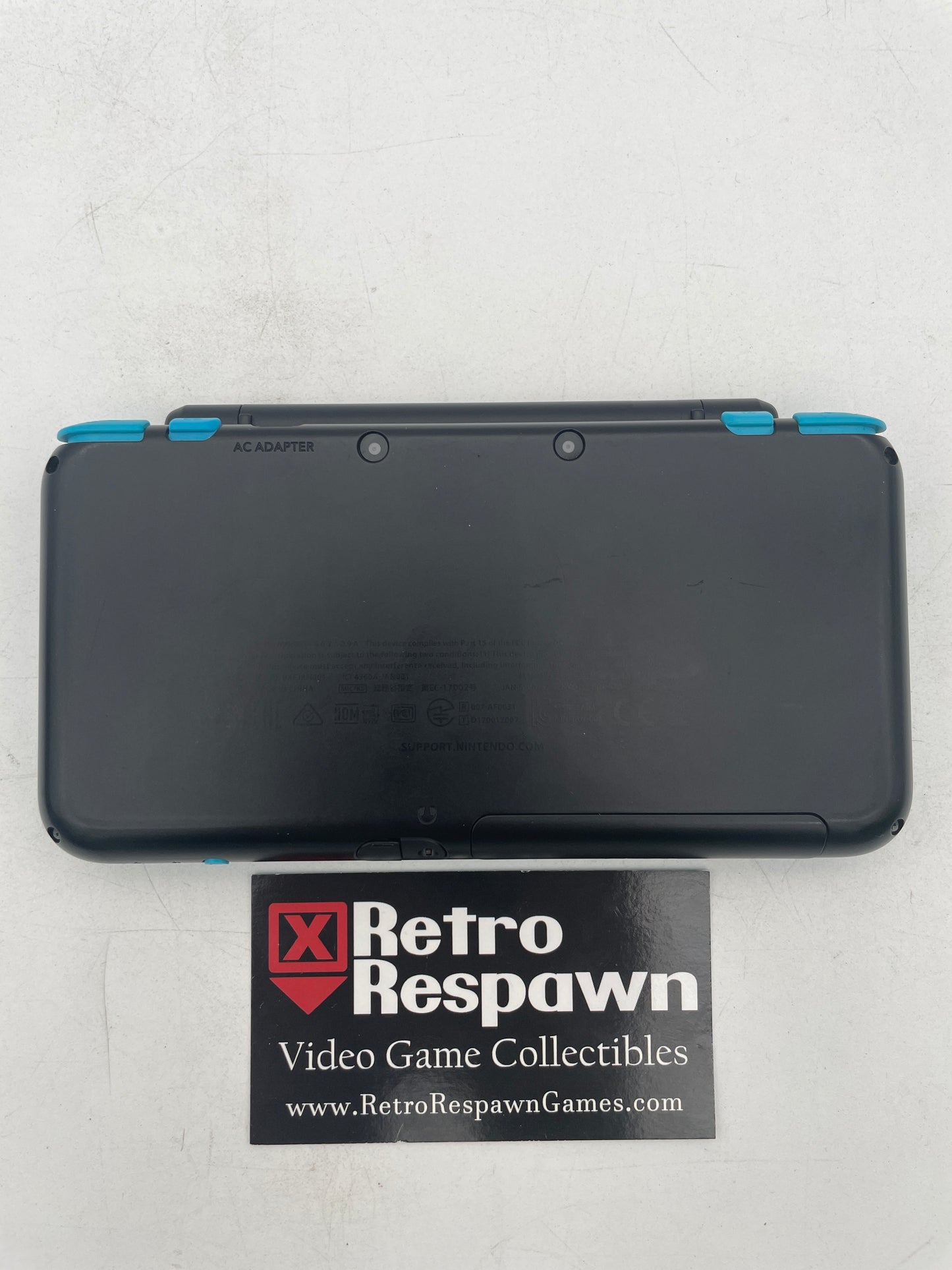 New Nintendo 2DS XL Black & Turquoise - Nintendo 3DS (Console + Charger)