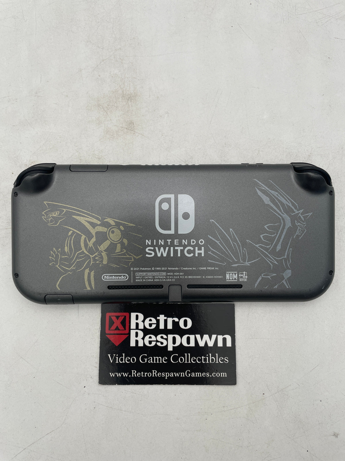 Nintendo Switch Lite: Dialga & Palkia Edition - Nintendo Switch (Console+Charger)