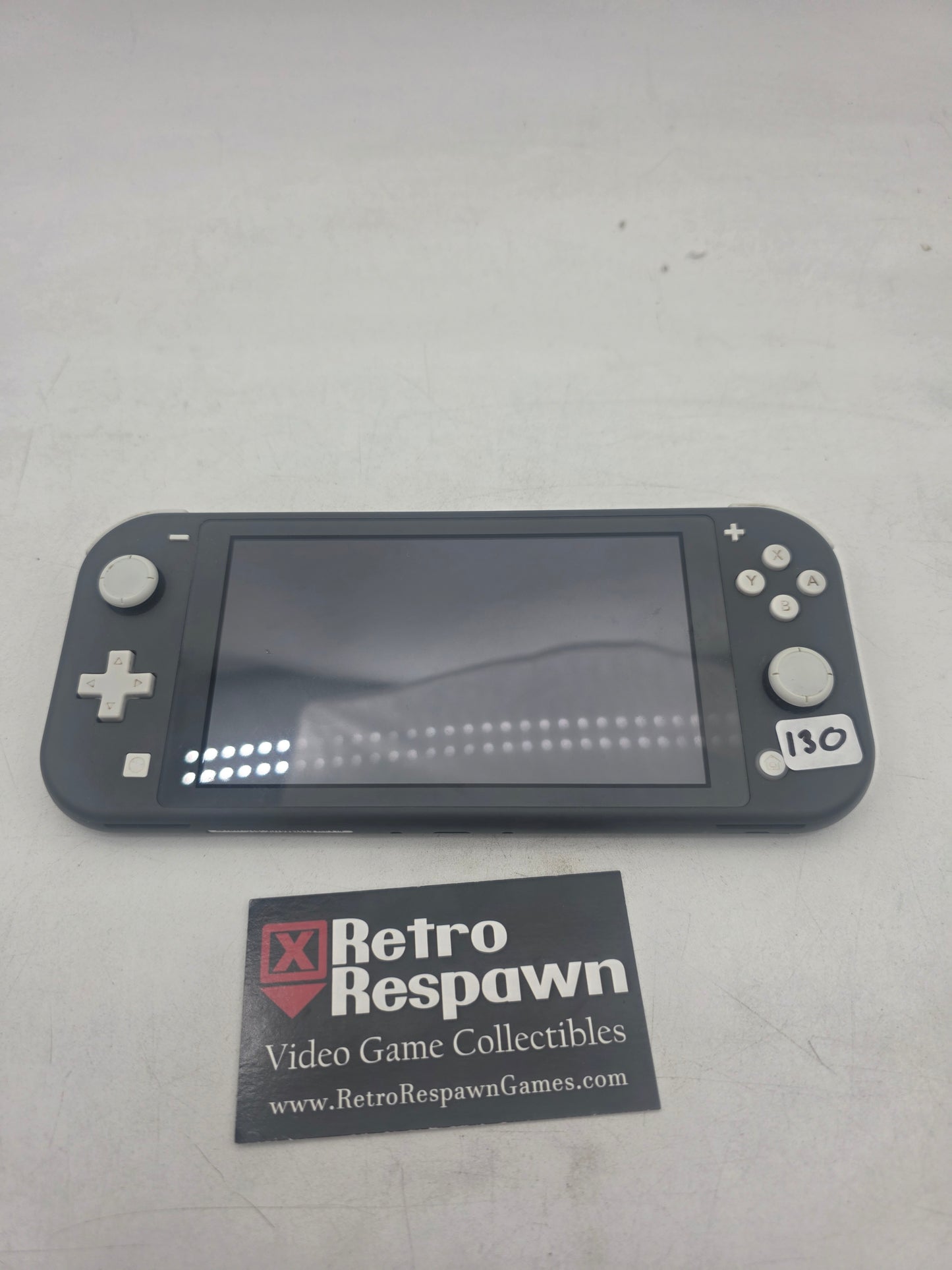 Nintendo Switch Lite [Gray] - Nintendo Switch (Console + Charger)